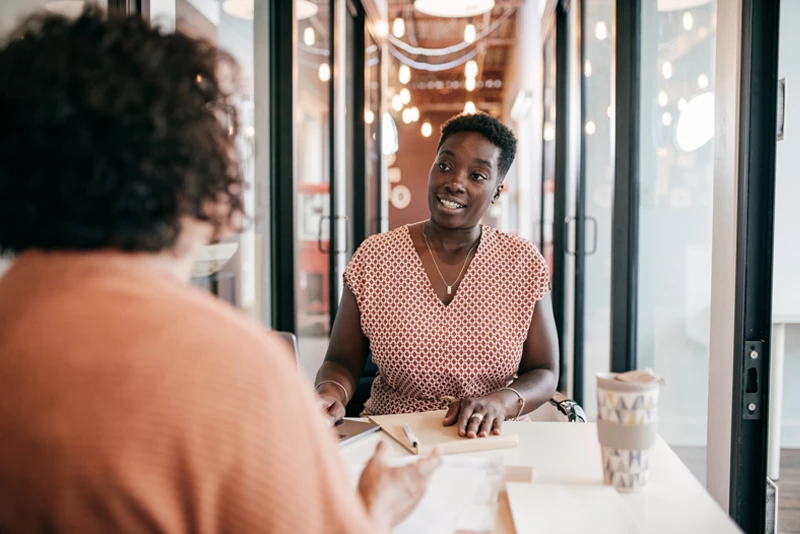 A banker meeting with her client