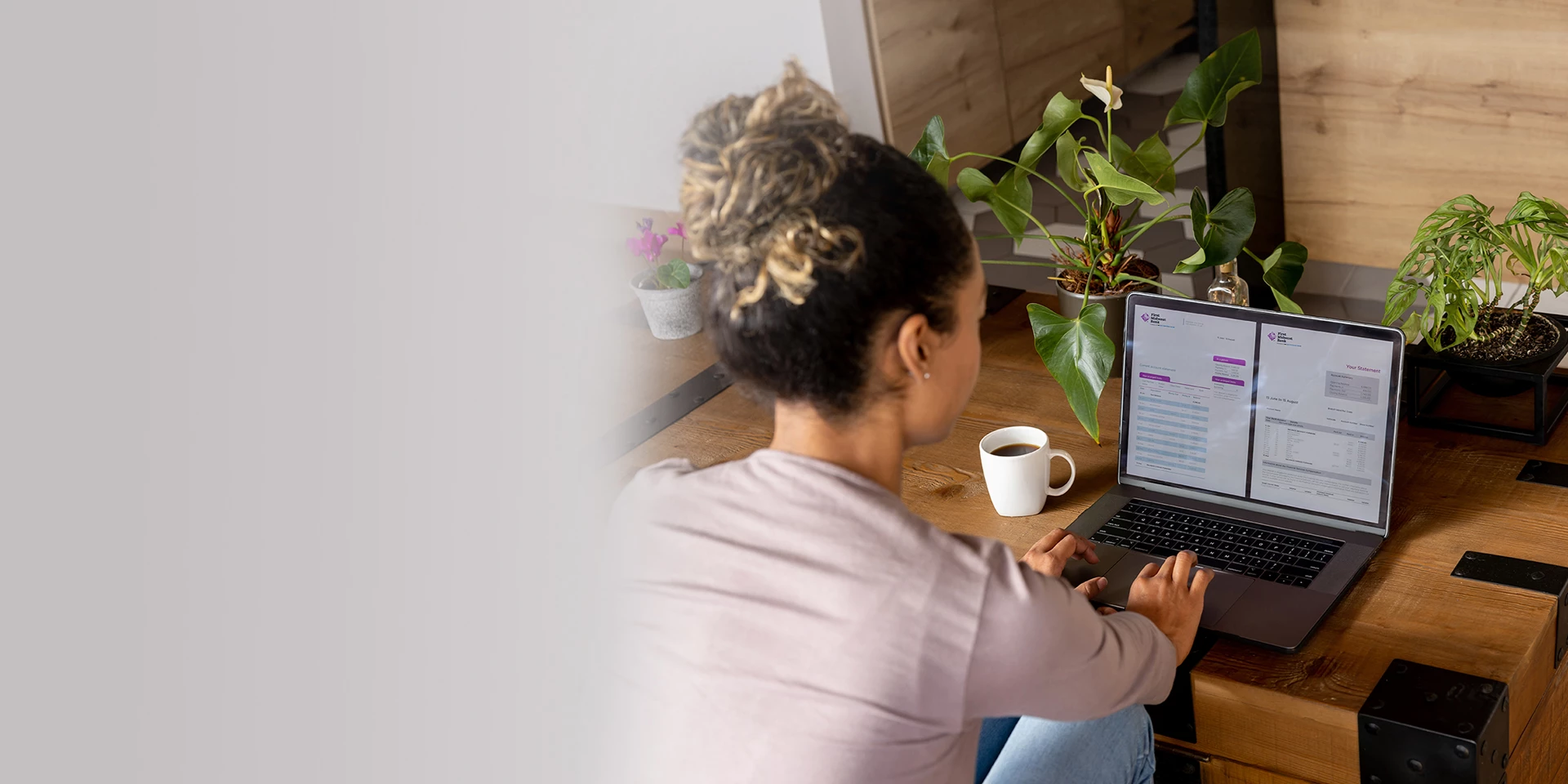 A client working on her laptop