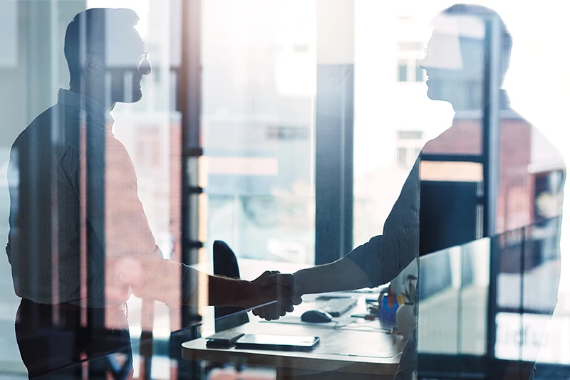 Two people shaking hands