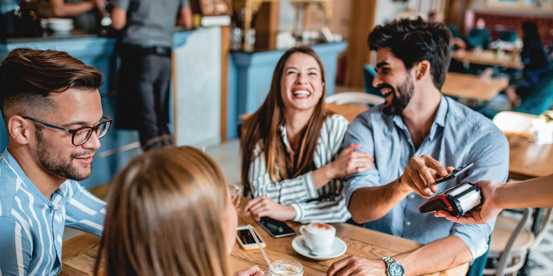 A couple paying through a digital payment