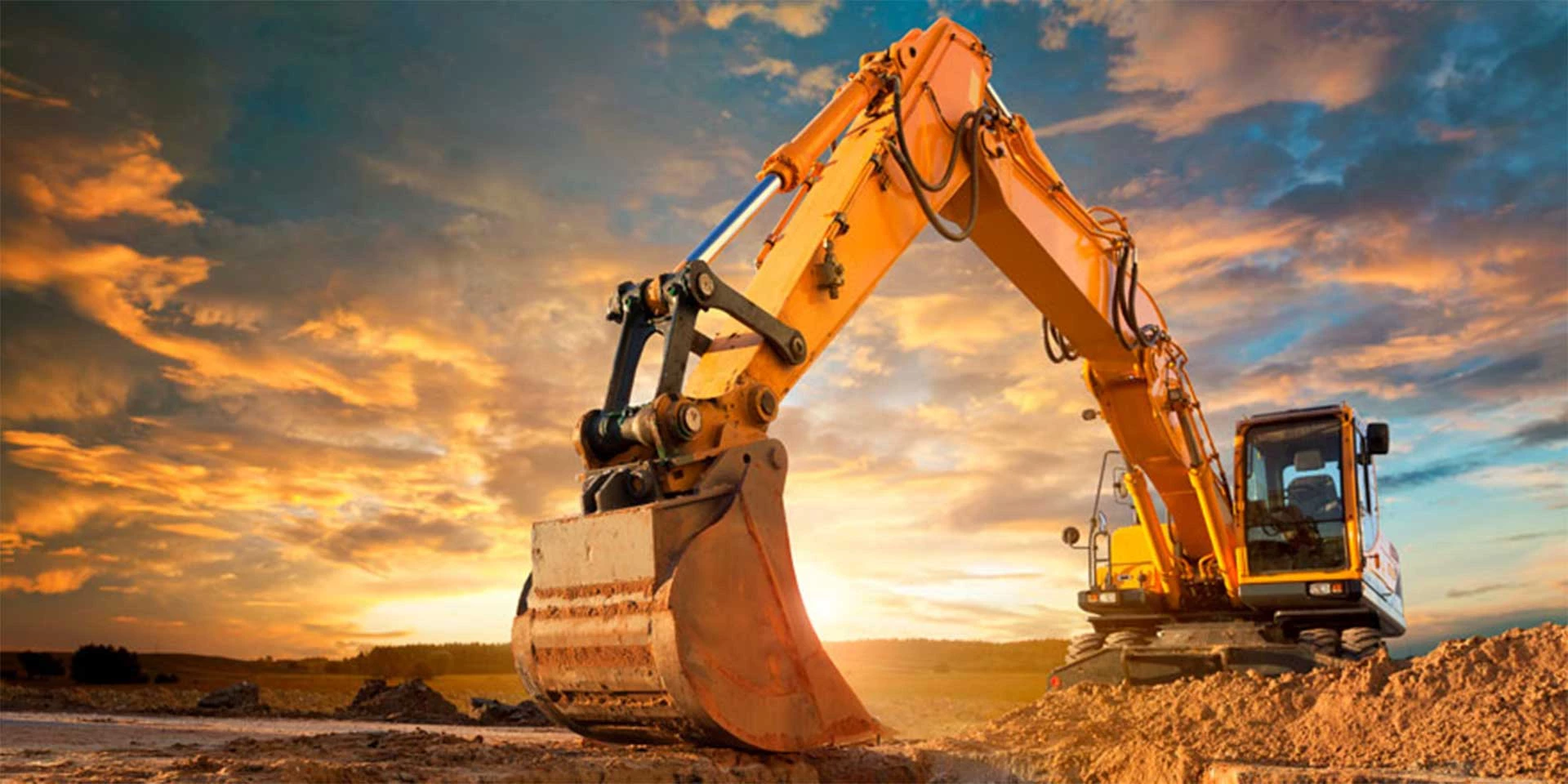 A new piece of excavating equipment and a backhoe that were purchased with an equipment financing loan
