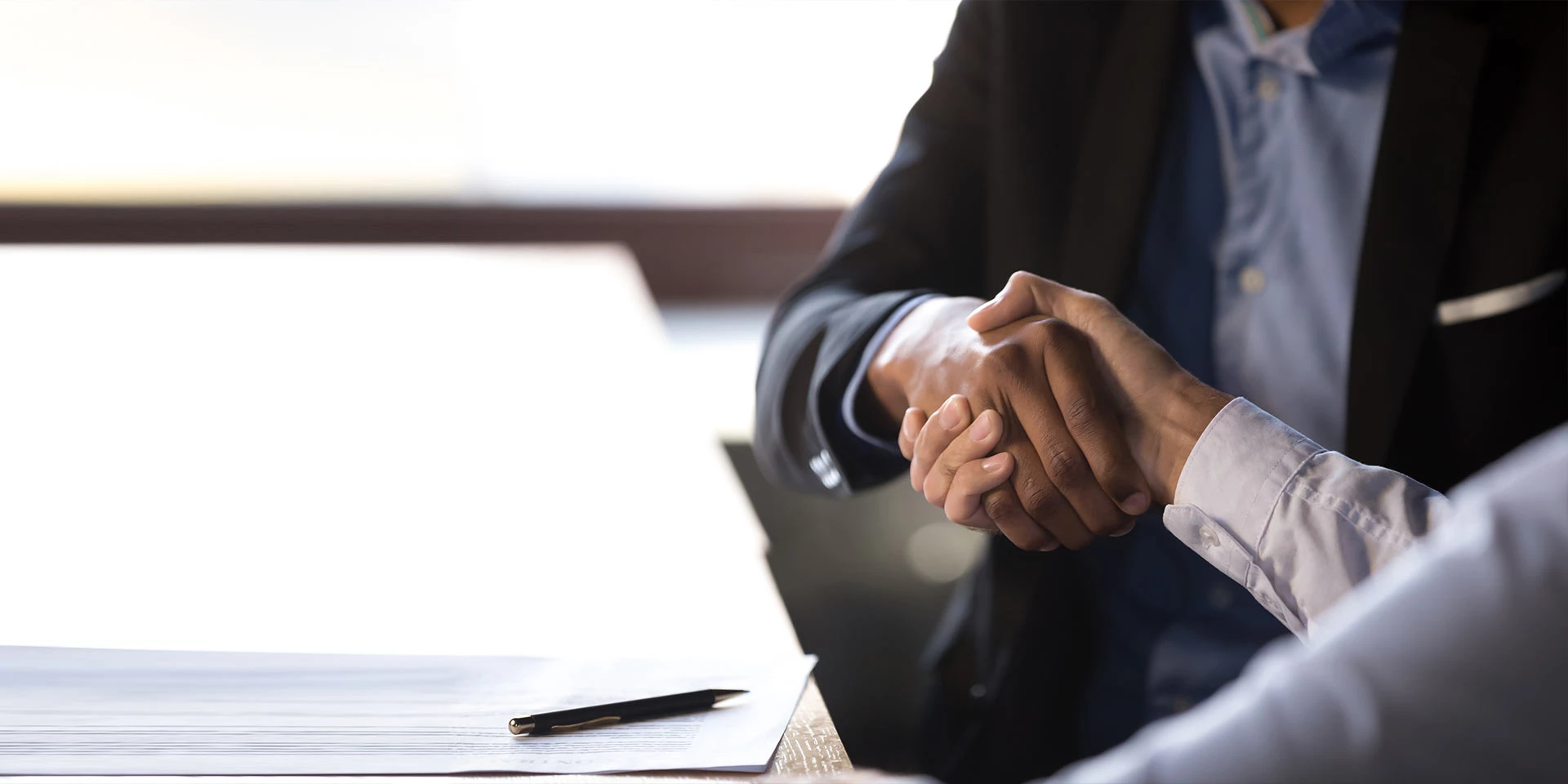 Two people shaking hands