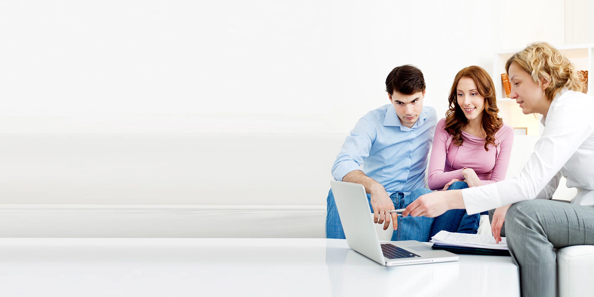 A woman professional financial planning with her clients