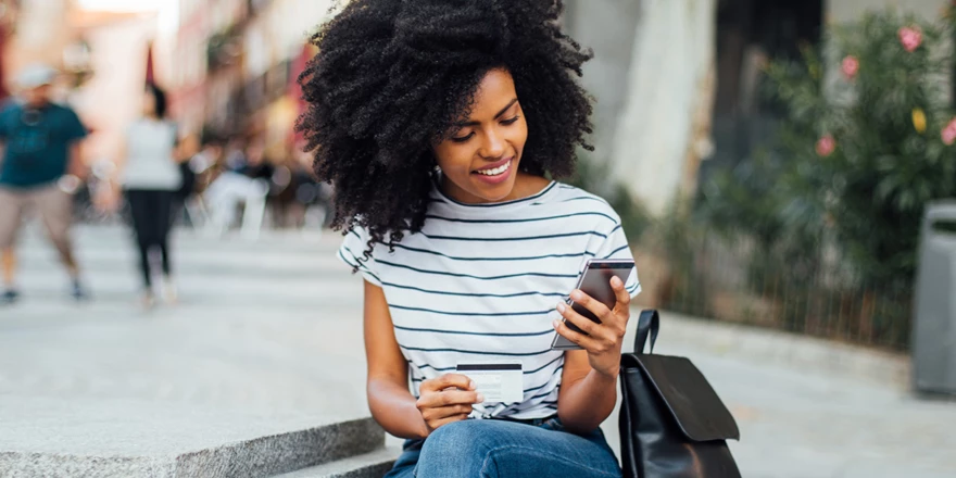 A young lady on her mobile device.