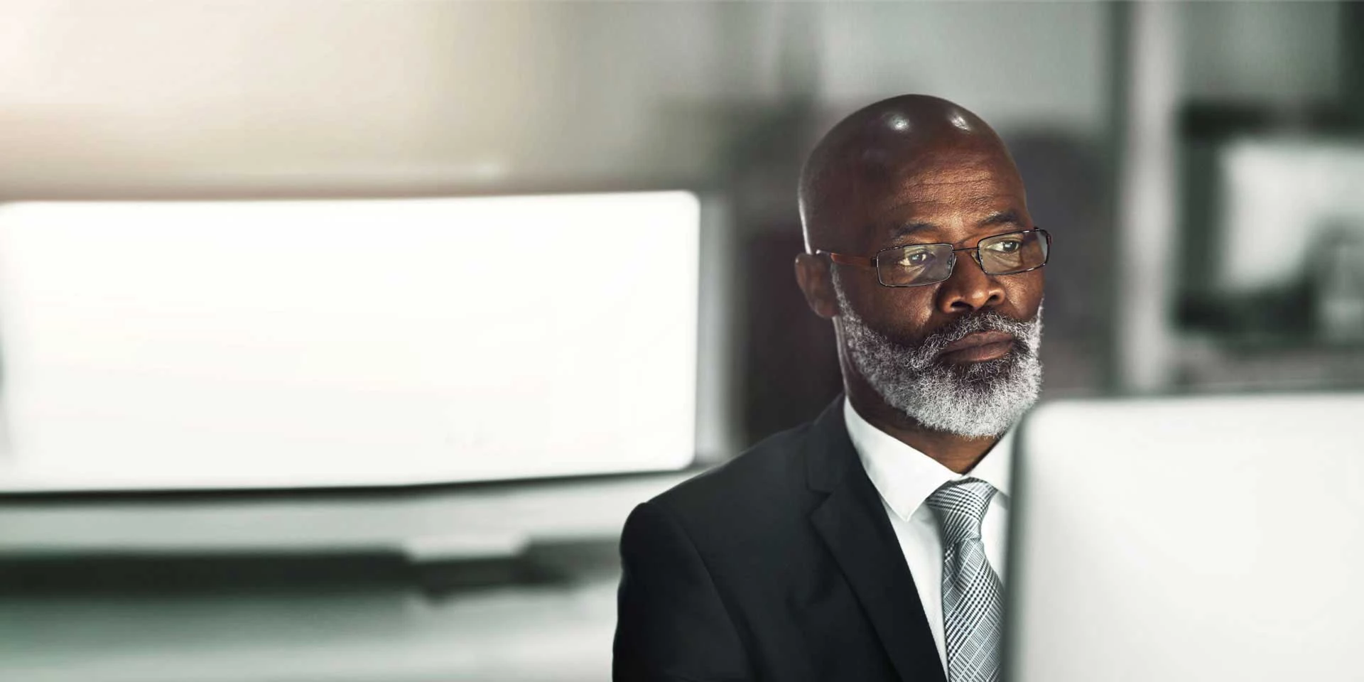 A businessman uses interest rate derivatives to help his business hedge against adverse movements in rates