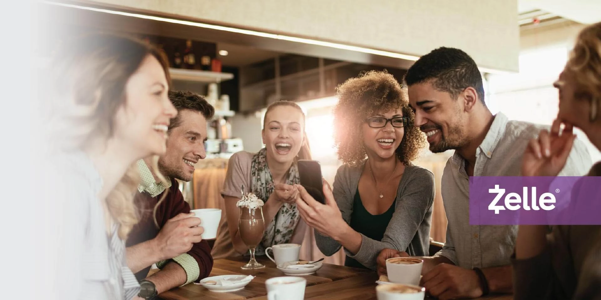 A group of friends sending money digitally to each other