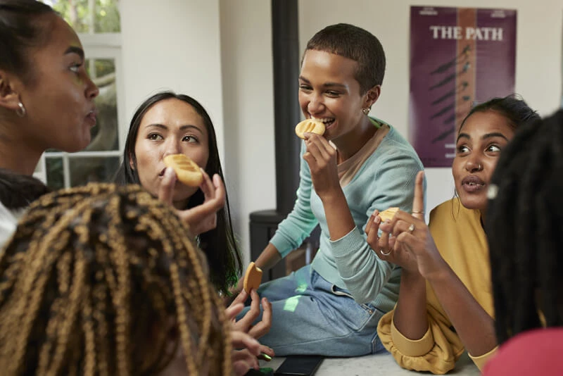 A family together snacking on food