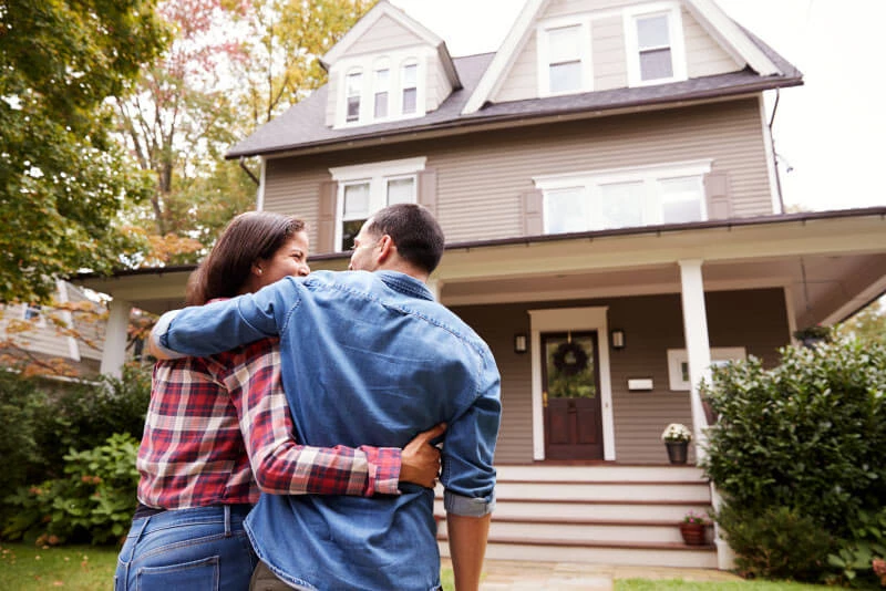 A couple closing the on their first home