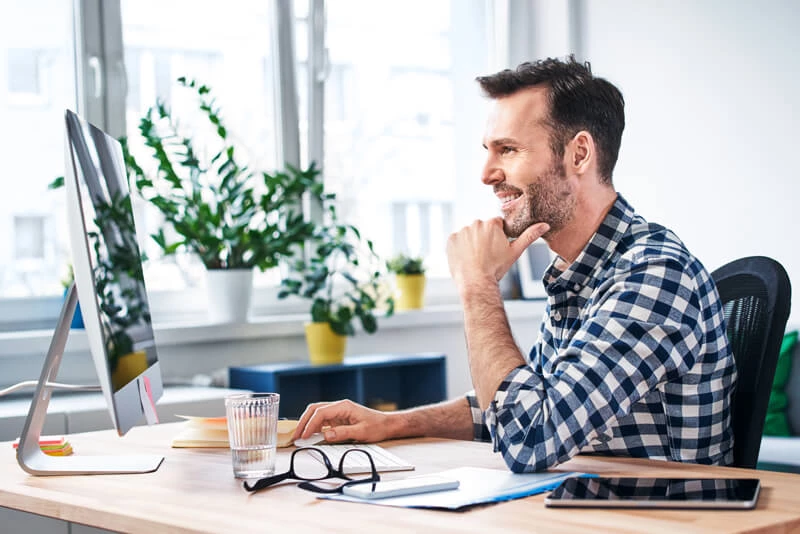 Gentleman viewing his statement online.