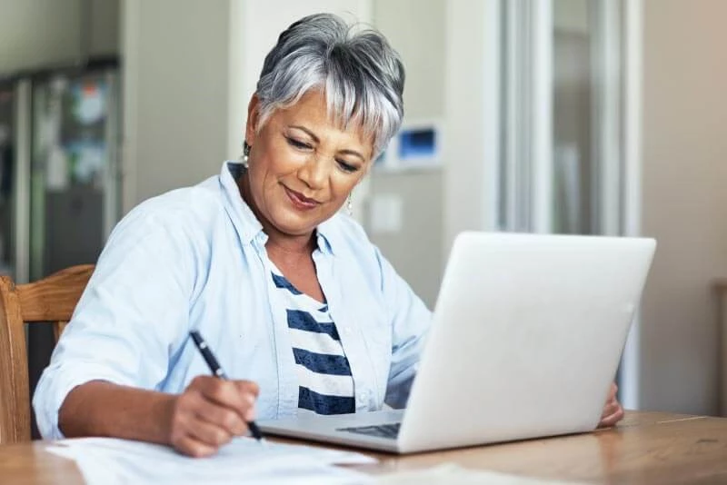 A woman working on her laptop