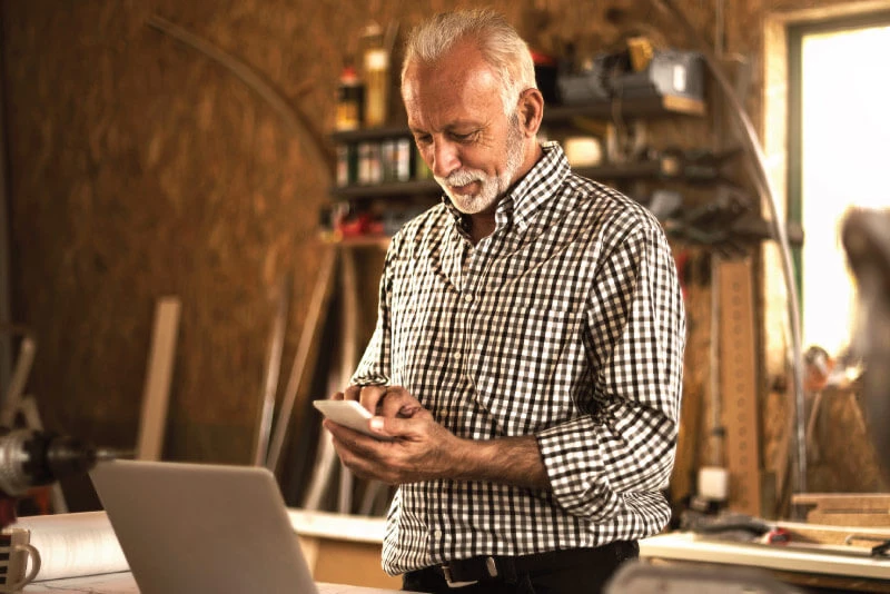 A small business owner clicking on a link