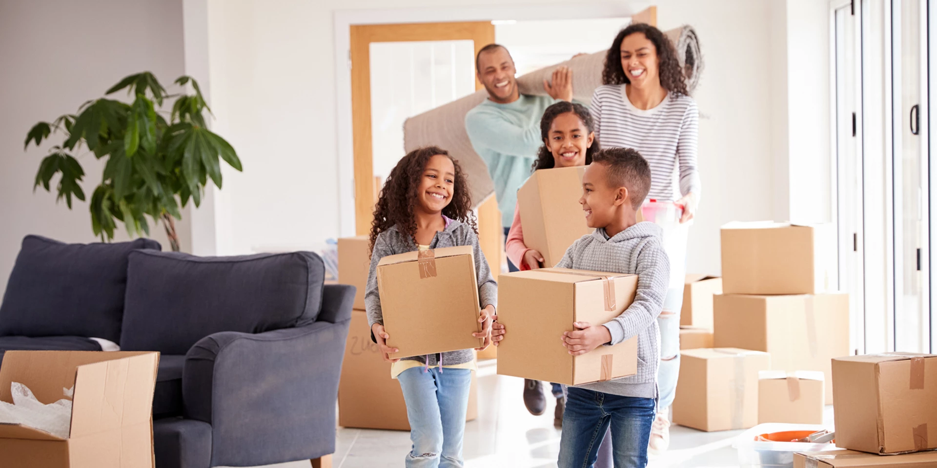 A family moving into their new house